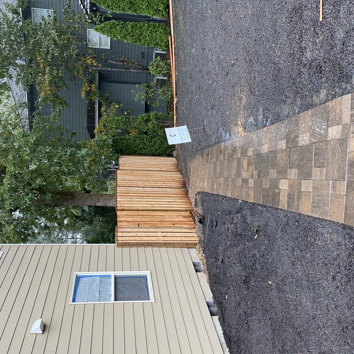 Paver walkway to fence