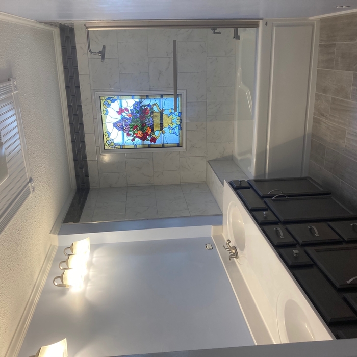 Completed tile walls, floor, and painted.