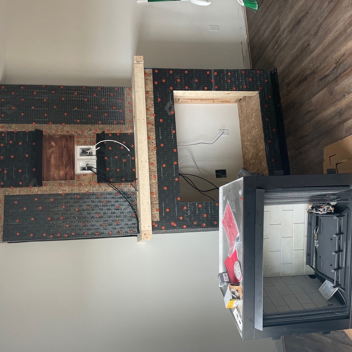 Framed fireplace before scratchcoat