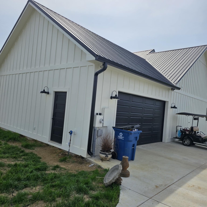 New gutters and downspouts
