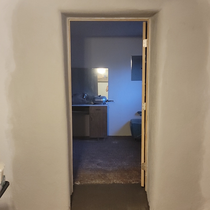 Door installed and concrete ramp poured