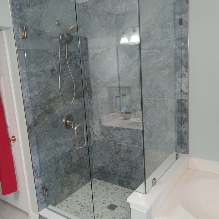 Glass shower enclosure