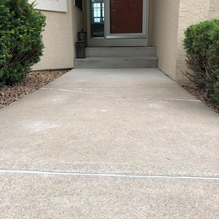 Sidewalk Restored to original height