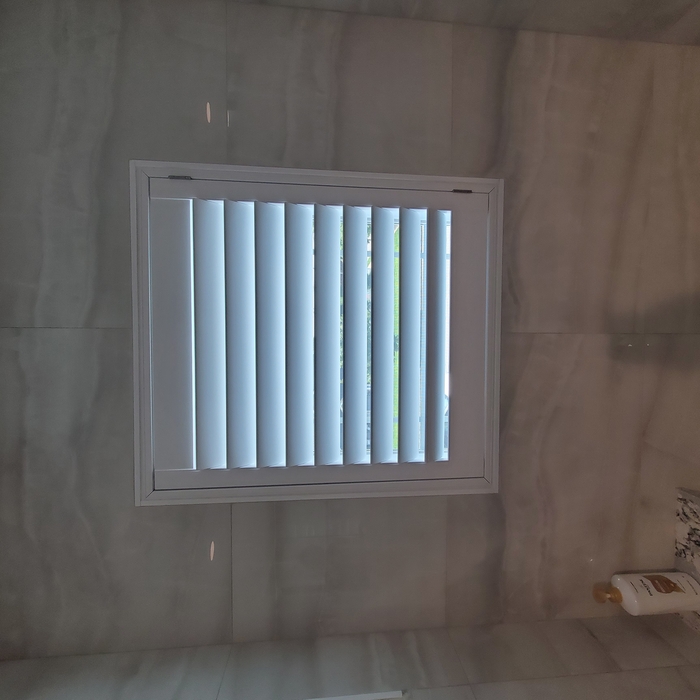 Waterproof shutter in shower of the master bath