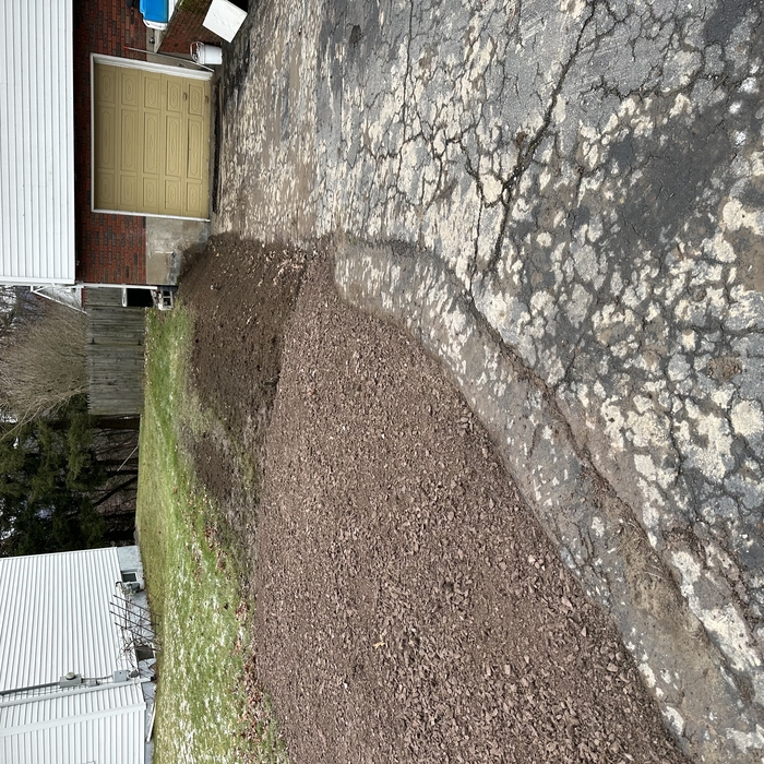 Wall removed and dirt sloped