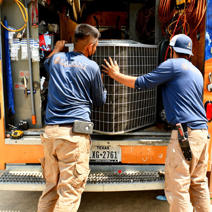 Techs ready to install HVAC unit