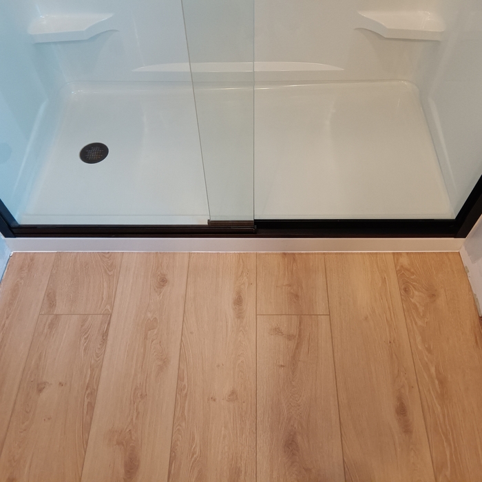 Properly sealed from floor to shower pan