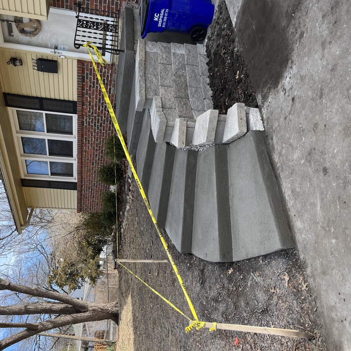 Concrete steps and retaining wall