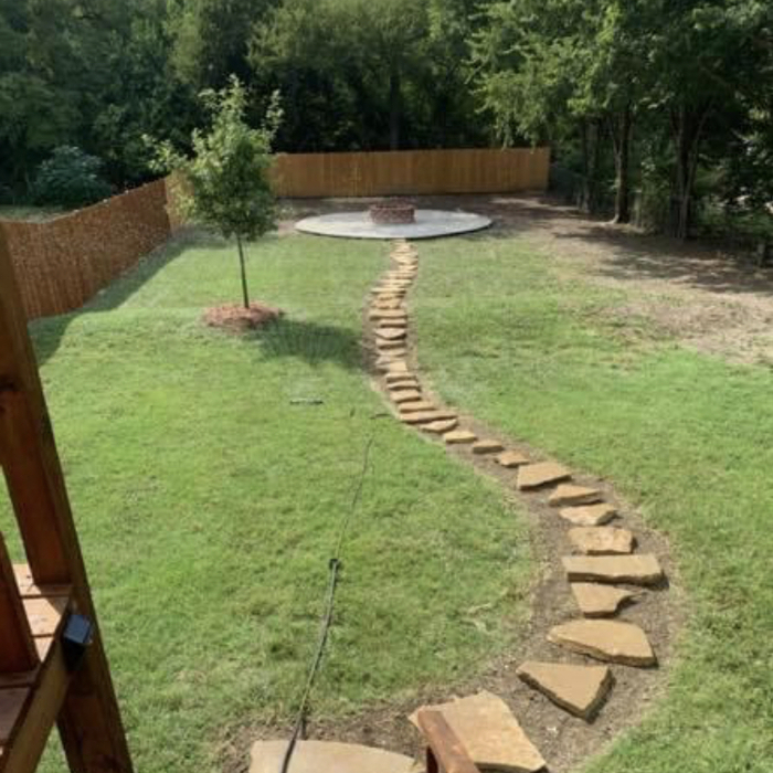 Added fire pit  and stone work walk way