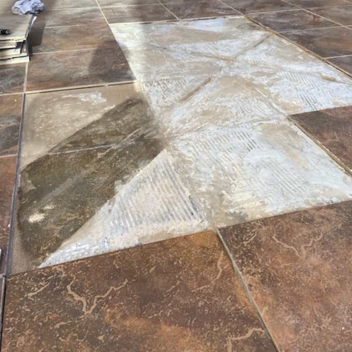 Courtyard tile reset