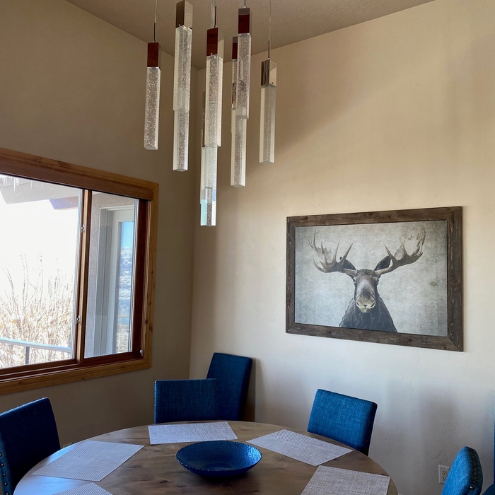 Replaced chandelier and hung decor