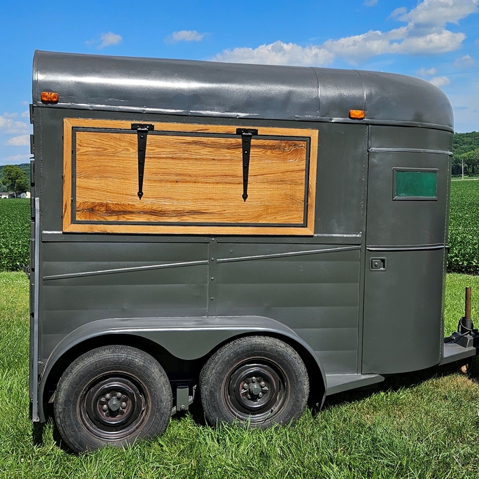 I converted horse trailer into a mobile bar