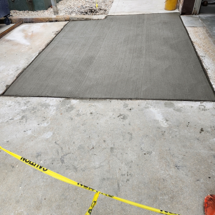 Damaged garage pad install