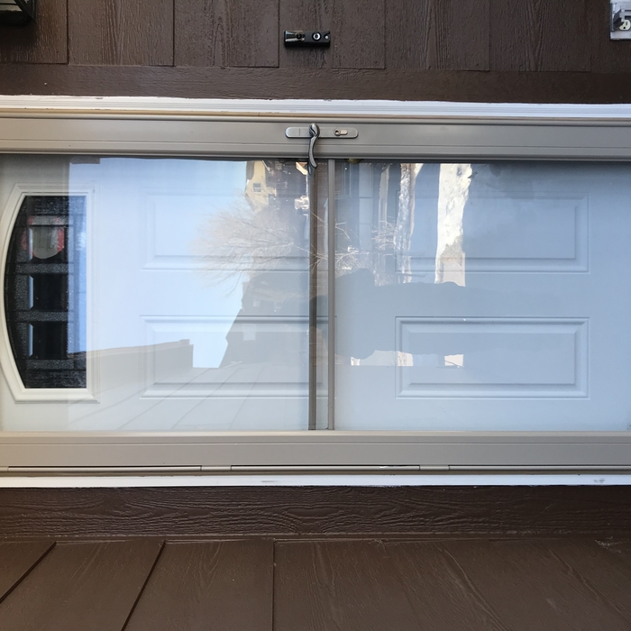 Entry door with storm door.