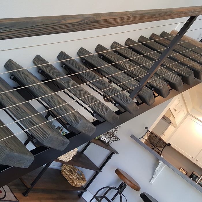 Custom staircase made to look like driftwood