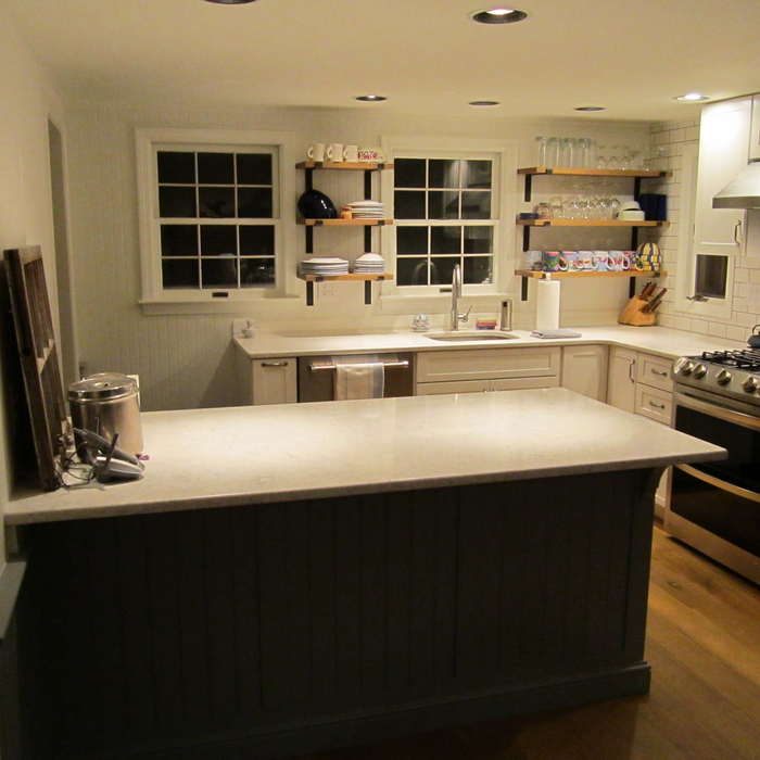 Kitchen remodel with peninsula and custom shelving