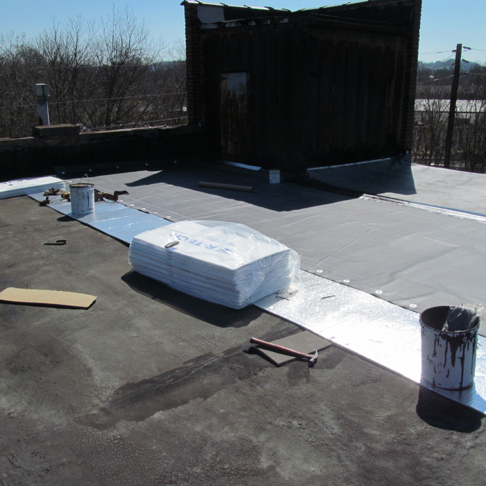 EPDM Roof being Installed.