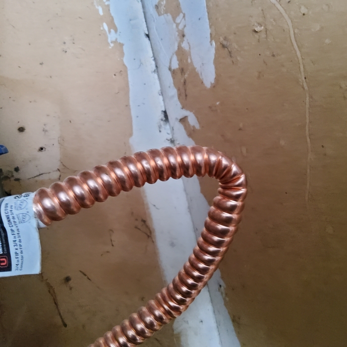 Crimped water supply lines.