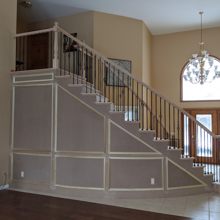 Curved stair remodel/ weinscoting