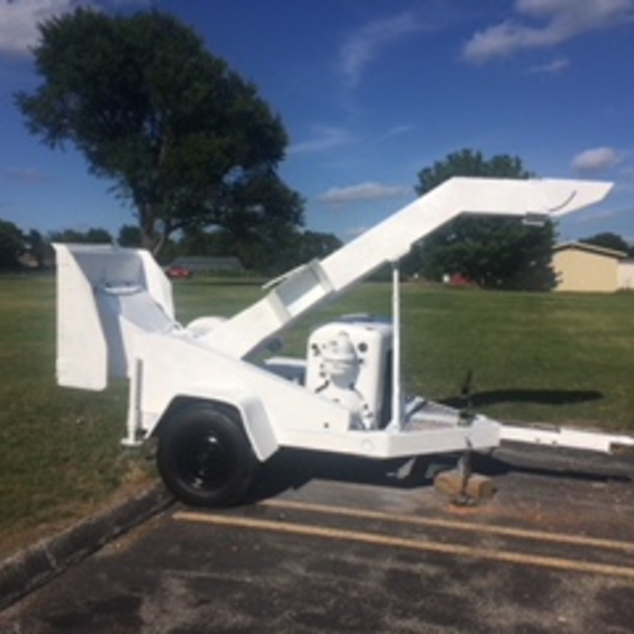 Woodchuck Chipper with 6 cylinder motor