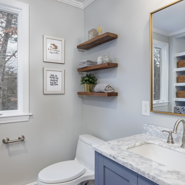 View of commode area and decor