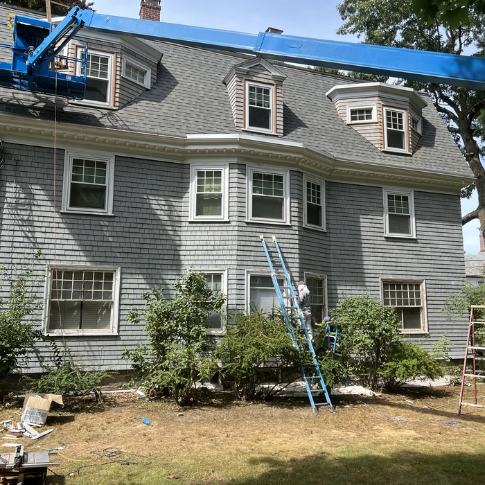Exterior paint with boom lift