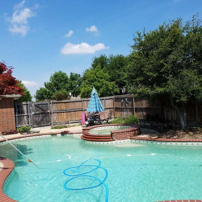 Vacuuming the Pool Bottom