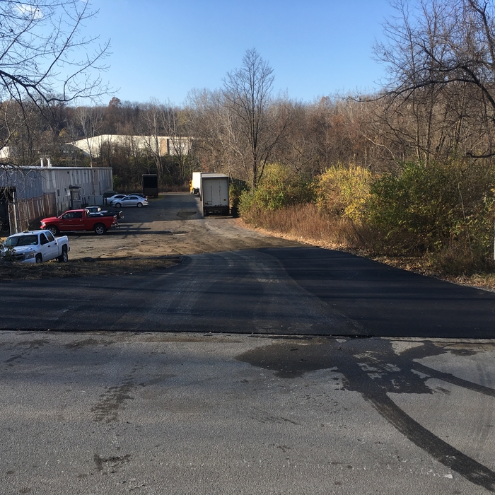 Finished asphalt entrance way.