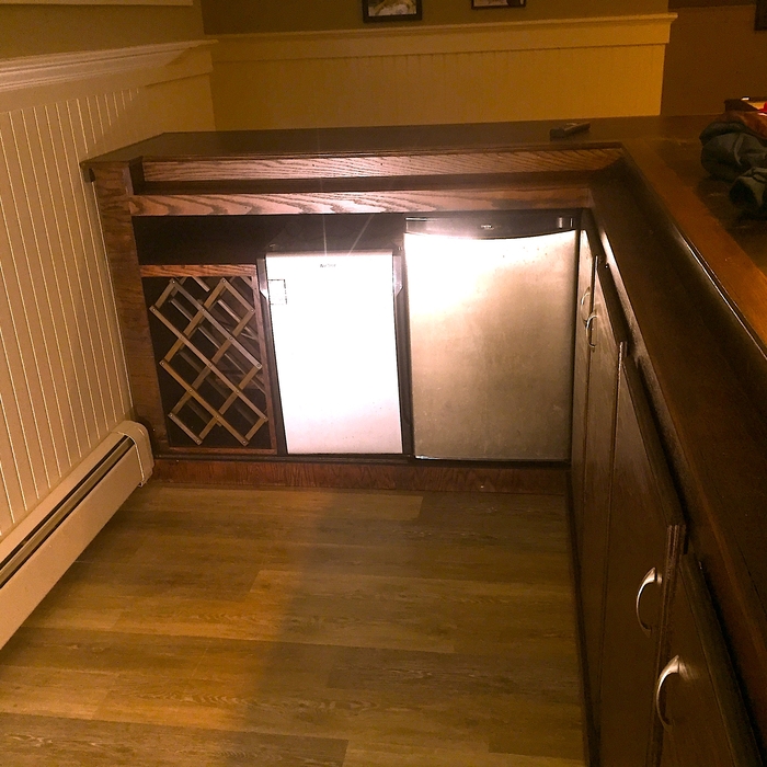 Bar with fridge and wine rack