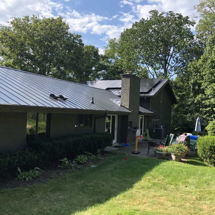 Solar panels on south slope Metal Roof