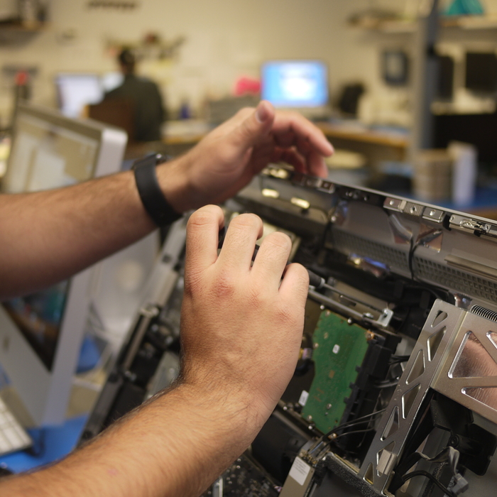 Tyson Repairing an iMac