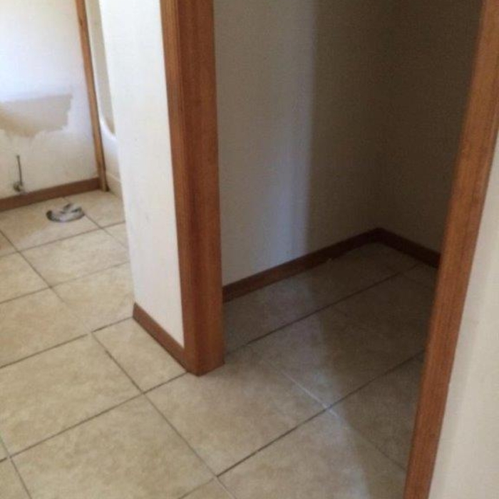 bathroom and closet tiled