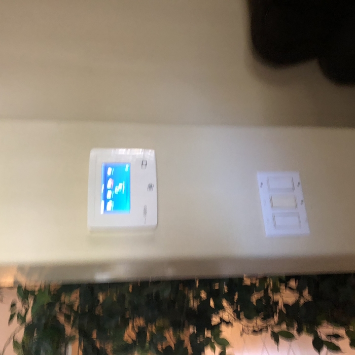 Alarm Panel nicely placed on wall near front entry