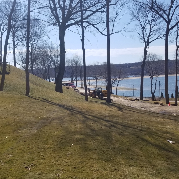Post grading and sod placement