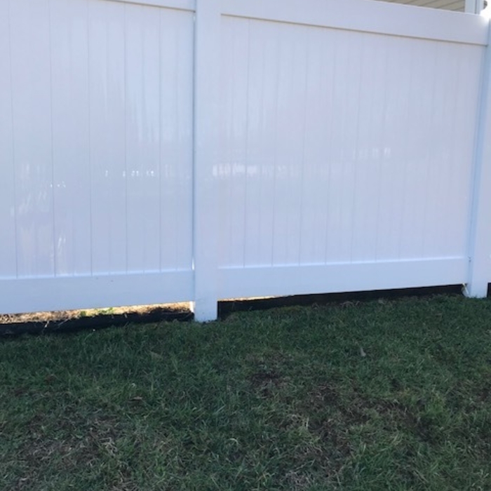 white fence.