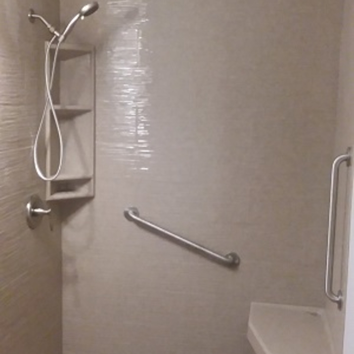 Onyx Shower with &quot;Wavy tile Pattern Walls&quo