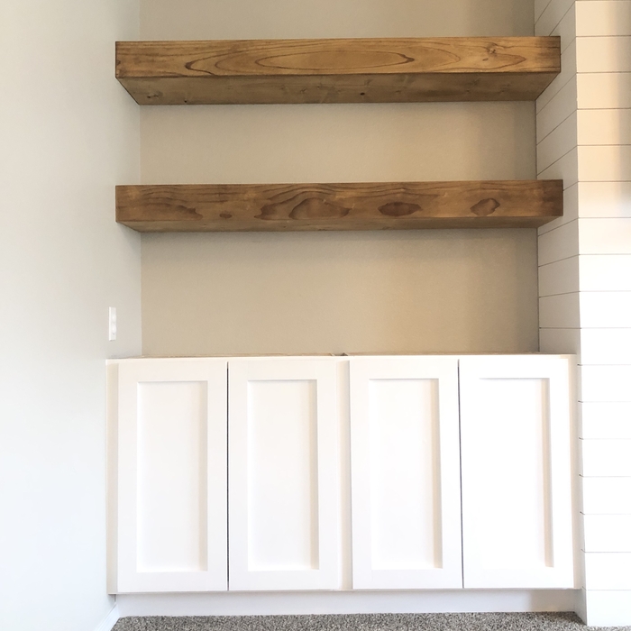 Built-in cabinets and floating shelves