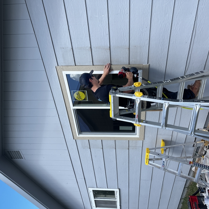 Brett Trimming Out Window Exterior Take 2
