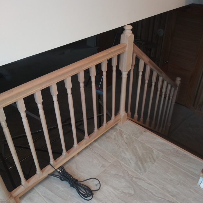 wooden banister, tile floor install finished
