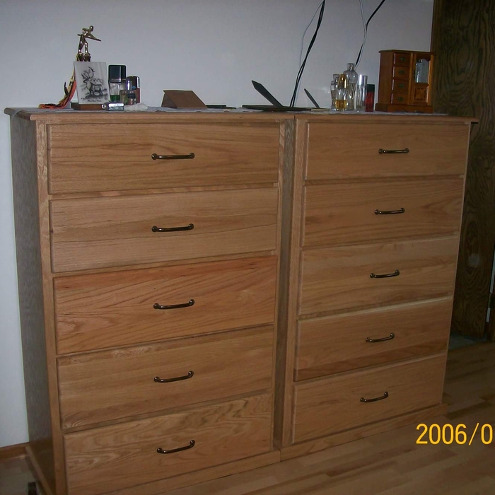 Two tall boys dressers