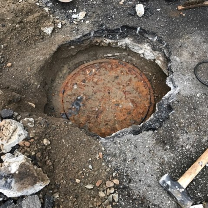 Uncovered manhole