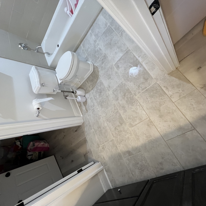 Grouted joints and install toilet