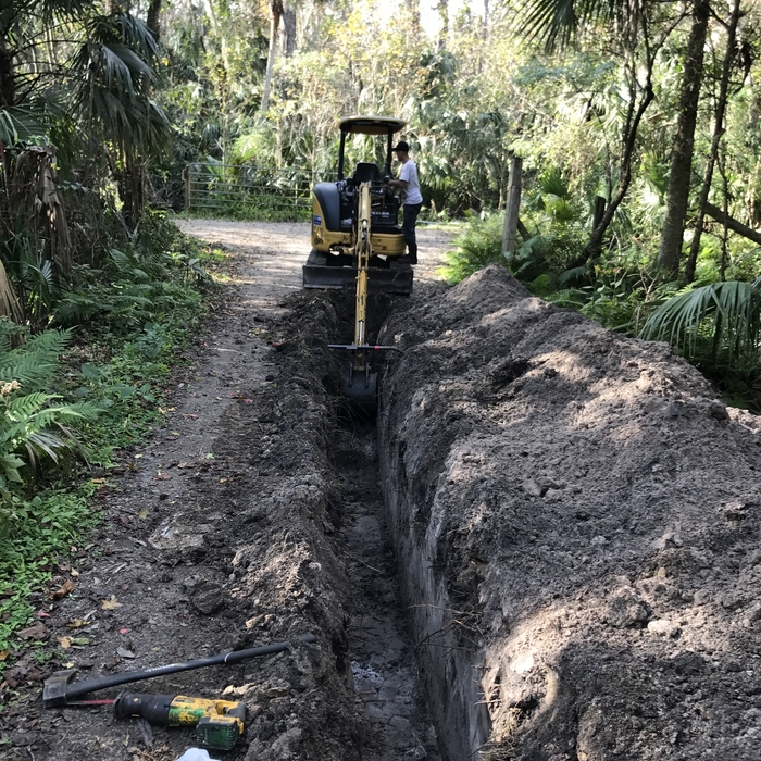 EXCAVATING FOR WATER MAIN LINE